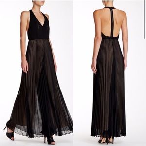 Like new Alice and Olivia plunge pleated jumpsuit